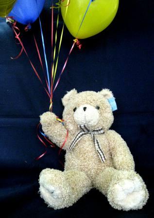 teddy bear with balloons